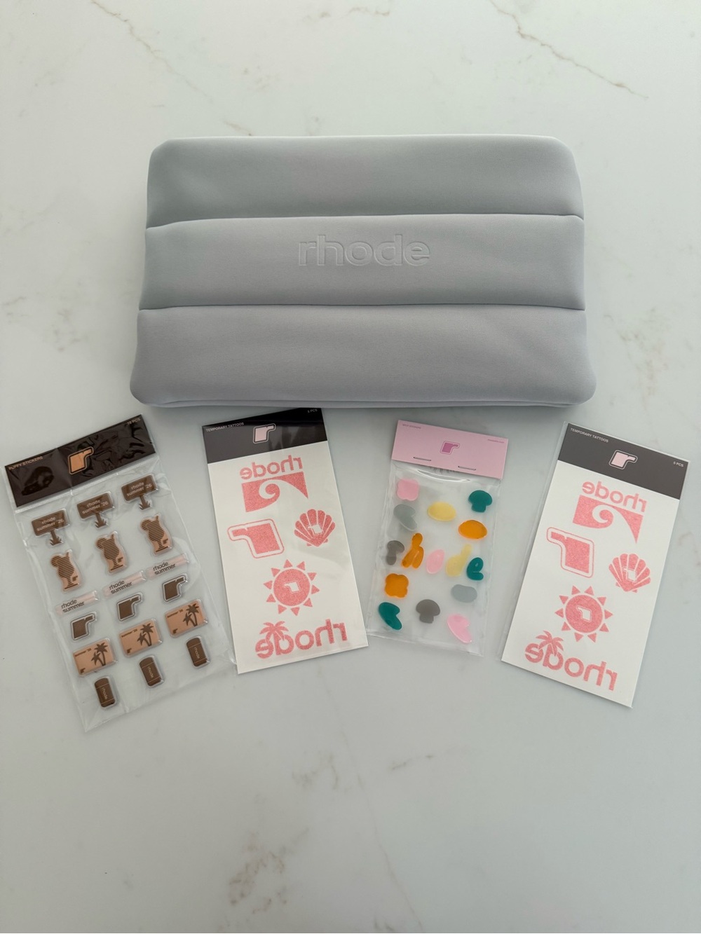 RHODE Limited Release Padded Cosmetic Pouch + Summer ’26 Sticker Tattoo Bundle
